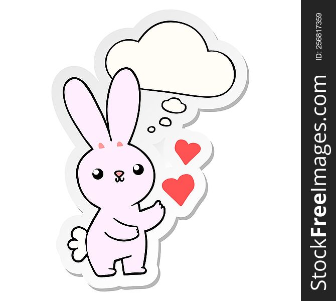 cute cartoon rabbit with love hearts and thought bubble as a printed sticker