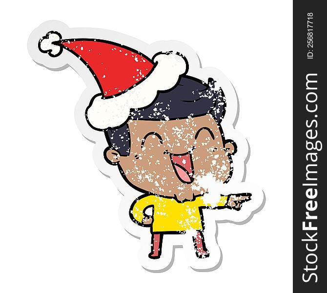 Distressed Sticker Cartoon Of A Man Laughing Wearing Santa Hat