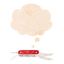 Cartoon Pocket Knife And Thought Bubble In Retro Textured Style Royalty Free Stock Photo