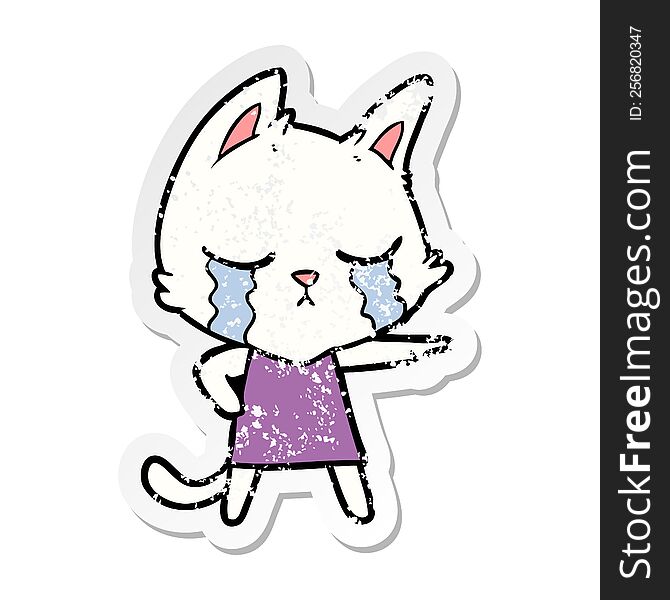 Distressed Sticker Of A Crying Cartoon Cat In Dress Pointing