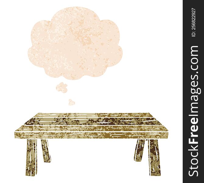 cartoon table with thought bubble in grunge distressed retro textured style. cartoon table with thought bubble in grunge distressed retro textured style