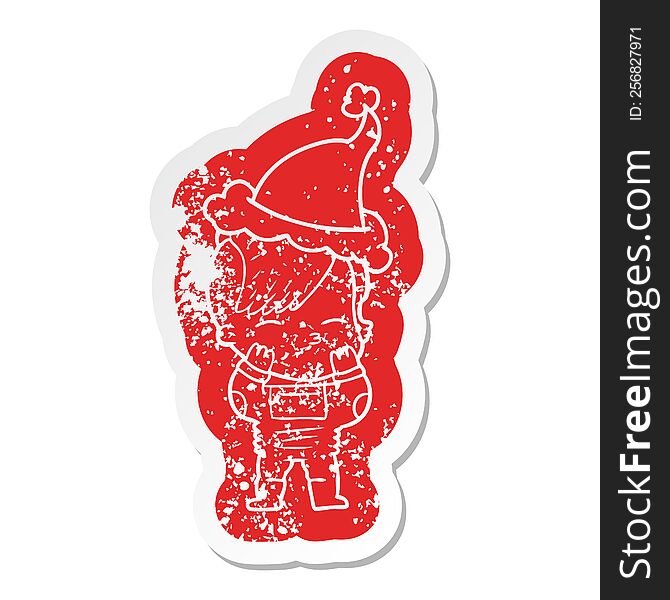 quirky cartoon distressed sticker of a girl wearing futuristic clothes wearing santa hat