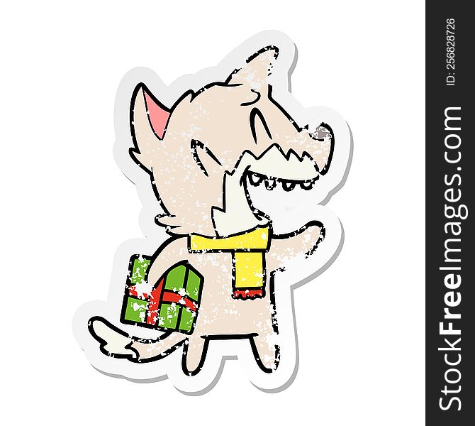 distressed sticker of a laughing christmas fox cartoon