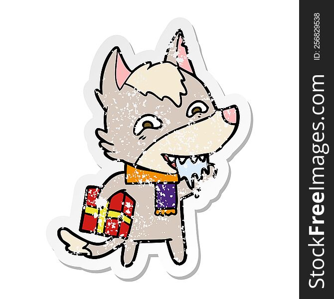 distressed sticker of a cartoon hungry wolf holding christmas present
