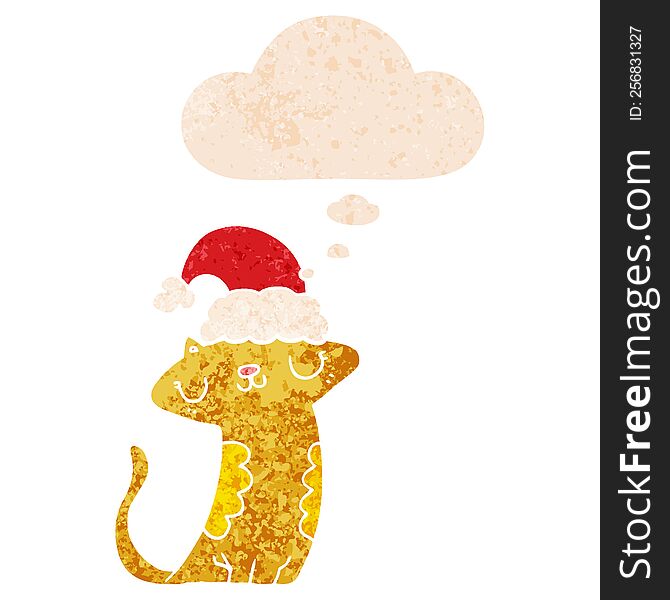 cute cartoon cat wearing christmas hat and thought bubble in retro textured style