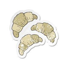 Retro Distressed Sticker Of A Cartoon Croissants Stock Photo Retro Distressed Sticker Of A Cartoon Croissants Stock Photo