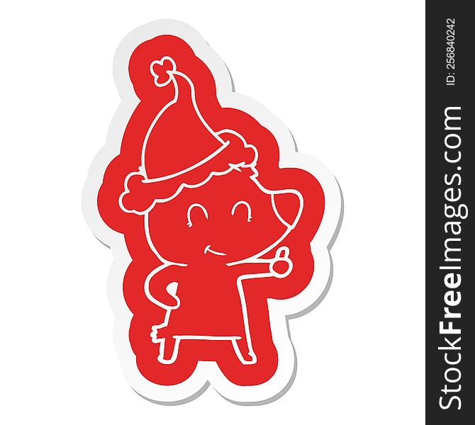 female bear quirky cartoon  sticker of a wearing santa hat
