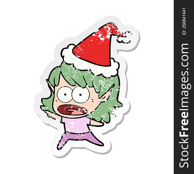 Distressed Sticker Cartoon Of A Shocked Elf Girl Wearing Santa Hat