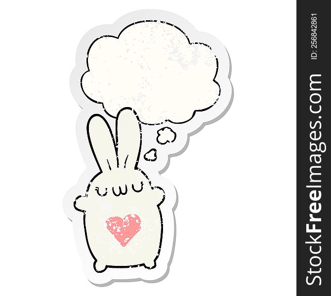 cute cartoon rabbit with love heart with thought bubble as a distressed worn sticker