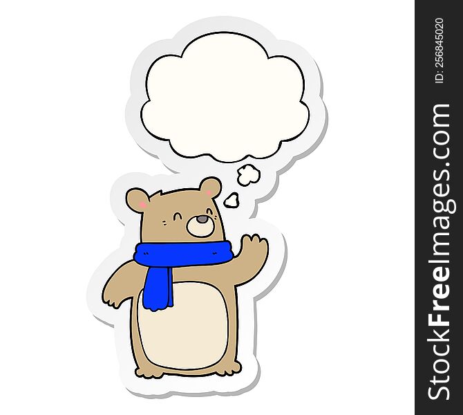 cartoon bear wearing scarf with thought bubble as a printed sticker