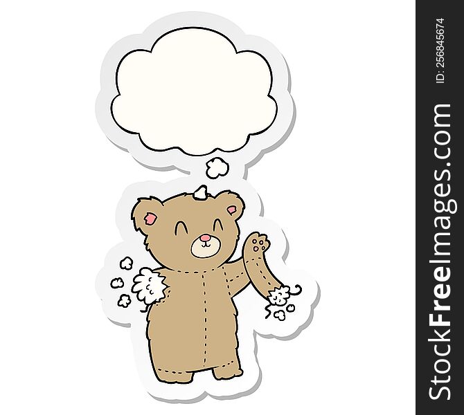 cartoon teddy bear with torn arm with thought bubble as a printed sticker