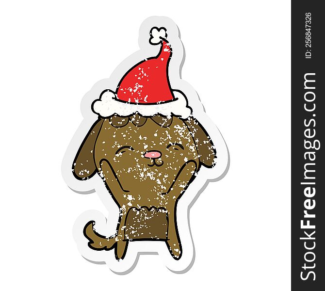Happy Distressed Sticker Cartoon Of A Dog Wearing Santa Hat