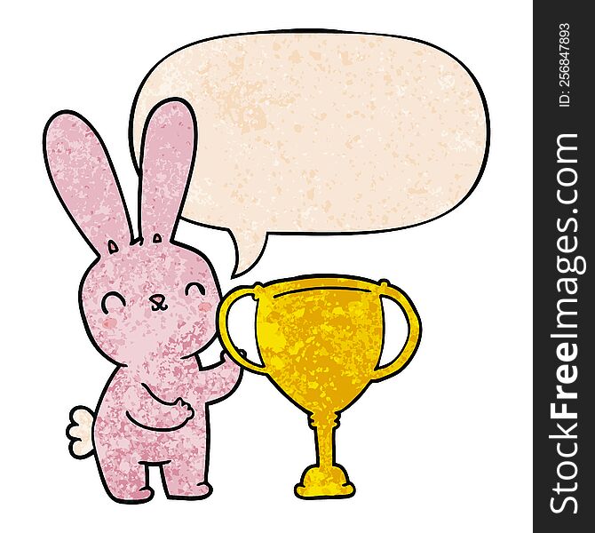 cute cartoon rabbit with sports trophy cup with speech bubble in retro texture style. cute cartoon rabbit with sports trophy cup with speech bubble in retro texture style