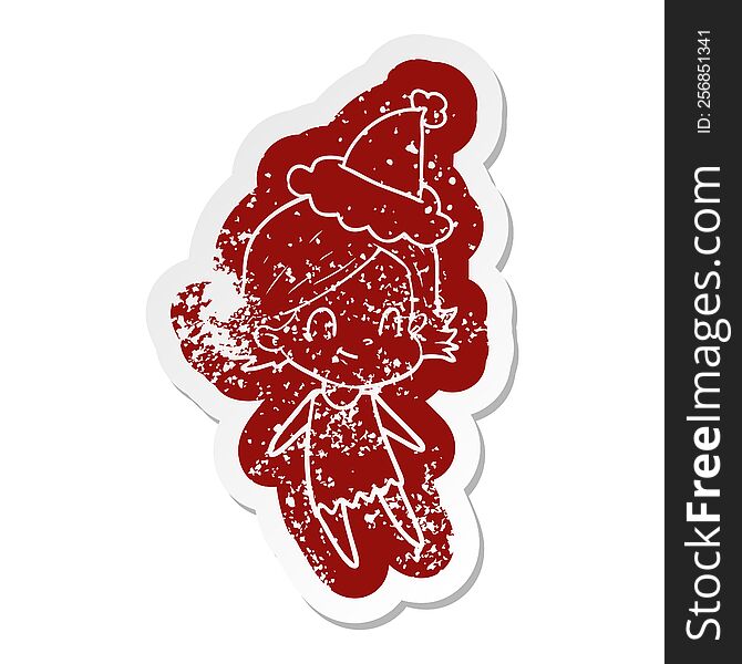 Cartoon Distressed Sticker Of A Friendly Girl Wearing Santa Hat