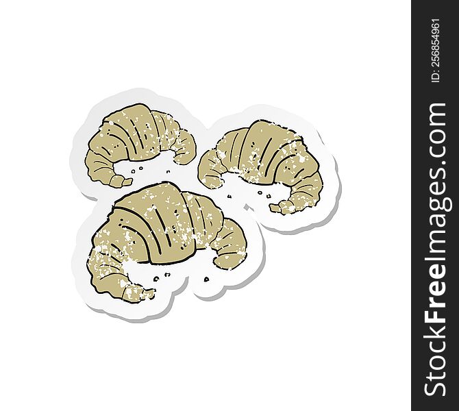 retro distressed sticker of a cartoon croissants