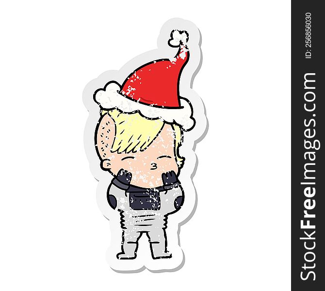 Distressed Sticker Cartoon Of A Girl Wearing Futuristic Clothes Wearing Santa Hat