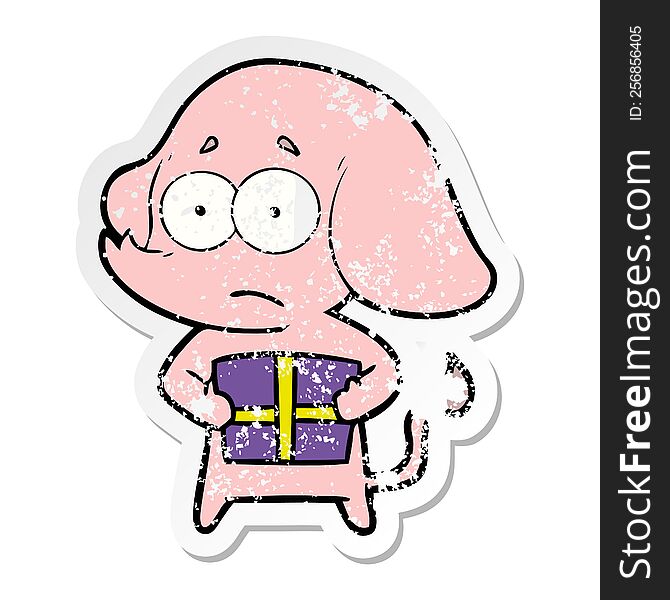 distressed sticker of a cartoon unsure elephant with christmas present