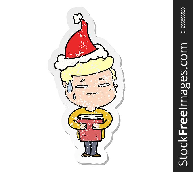 hand drawn distressed sticker cartoon of a anxious boy carrying book wearing santa hat