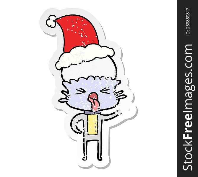 disgusted hand drawn distressed sticker cartoon of a alien wearing santa hat