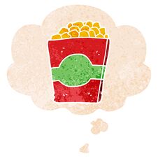 Cartoon Popcorn And Thought Bubble In Retro Textured Style Royalty Free Stock Images