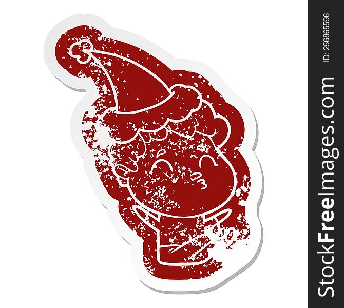 Cartoon Distressed Sticker Of A Man Pouting Wearing Santa Hat