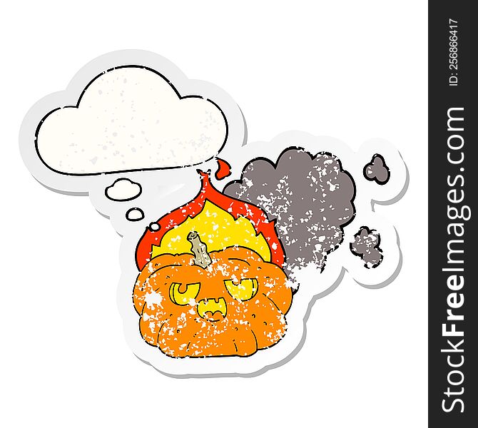 cartoon flaming halloween pumpkin with thought bubble as a distressed worn sticker