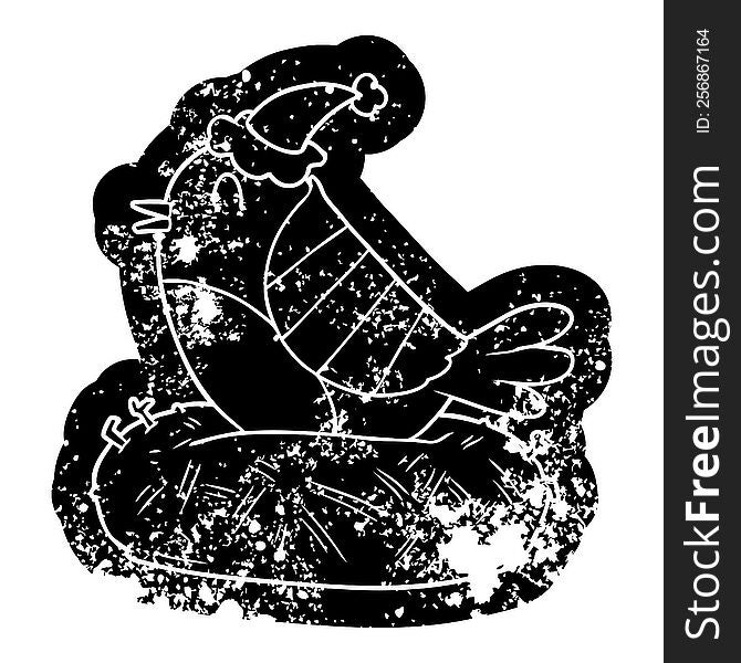 Cartoon Distressed Icon Of A Bird Sitting On Nest Wearing Santa Hat