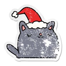 Christmas Distressed Sticker Cartoon Of Kawaii Cat Stock Photo