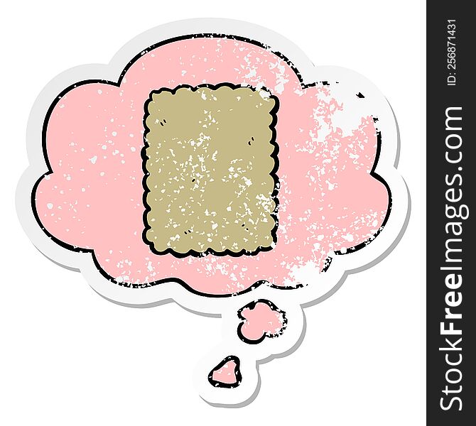 cartoon biscuit with thought bubble as a distressed worn sticker