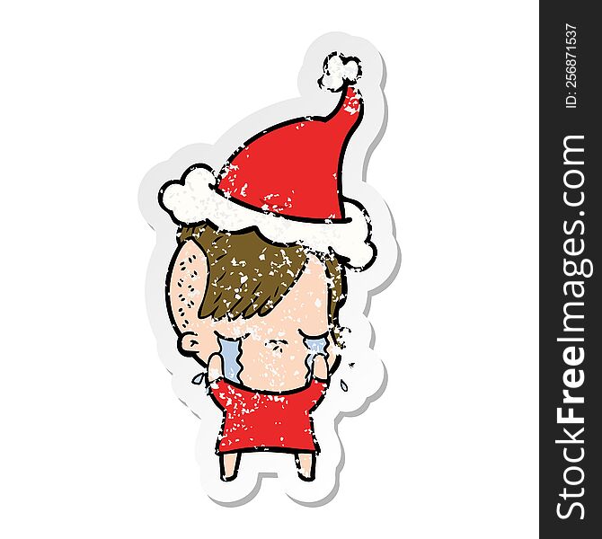 Distressed Sticker Cartoon Of A Crying Girl Wearing Santa Hat