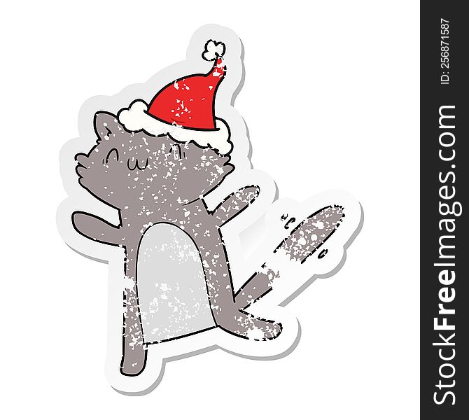 Distressed Sticker Cartoon Of A Dancing Cat Wearing Santa Hat