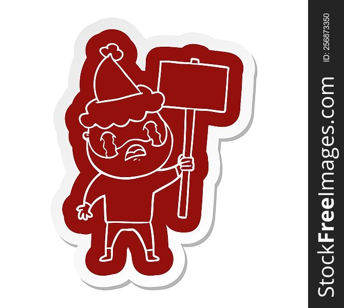 quirky cartoon  sticker of a bearded protester crying wearing santa hat