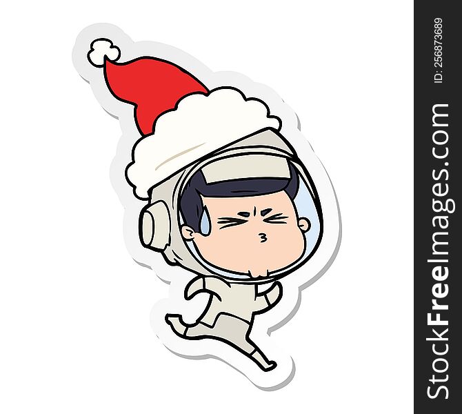 hand drawn sticker cartoon of a stressed astronaut wearing santa hat