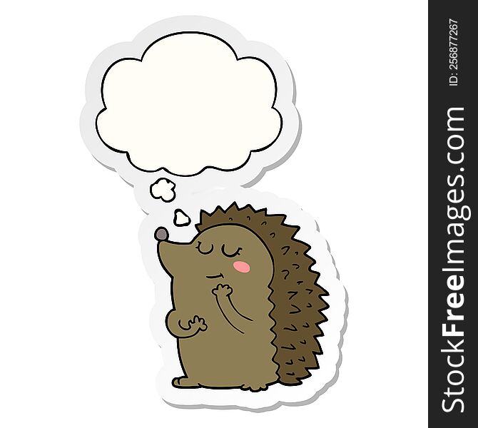 cute cartoon hedgehog with thought bubble as a printed sticker