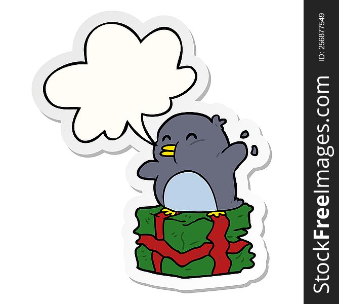 Cartoon Penguin On Wrapped Present And Speech Bubble Sticker
