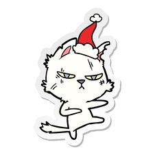 Tough Sticker Cartoon Of A Cat Wearing Santa Hat Stock Photo