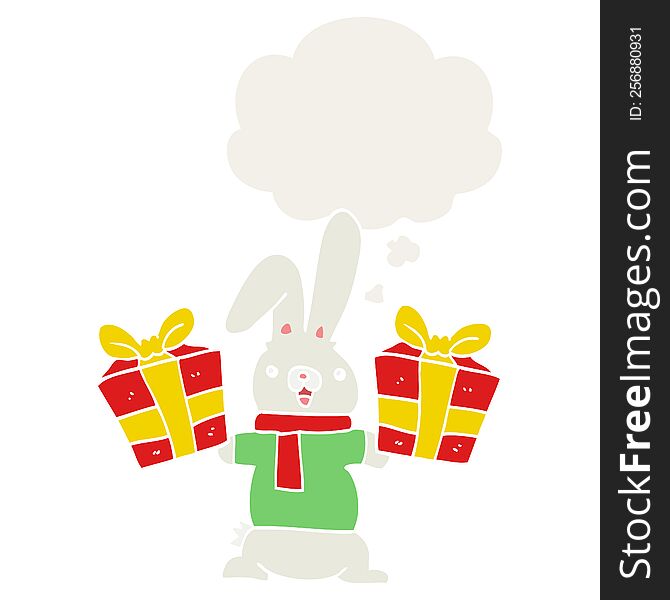 cartoon rabbit with christmas presents with thought bubble in retro style