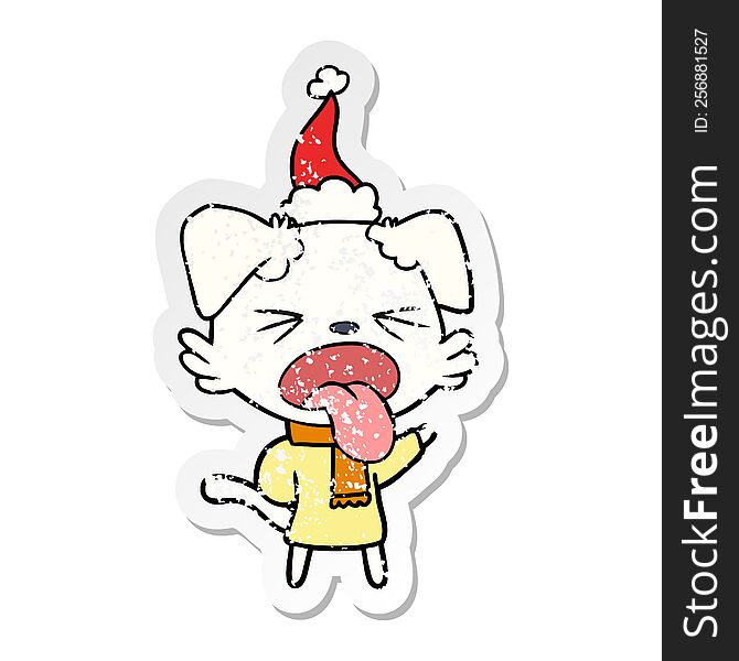 hand drawn distressed sticker cartoon of a dog wearing scarf and pullover wearing santa hat