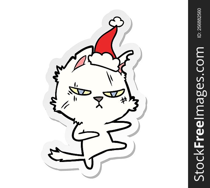 tough hand drawn sticker cartoon of a cat wearing santa hat. tough hand drawn sticker cartoon of a cat wearing santa hat