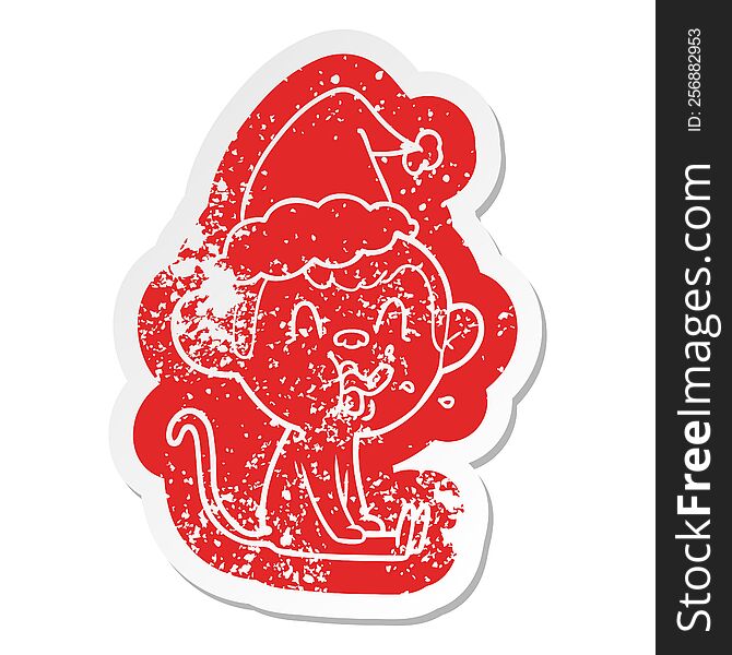 Crazy Cartoon Distressed Sticker Of A Monkey Sitting Wearing Santa Hat