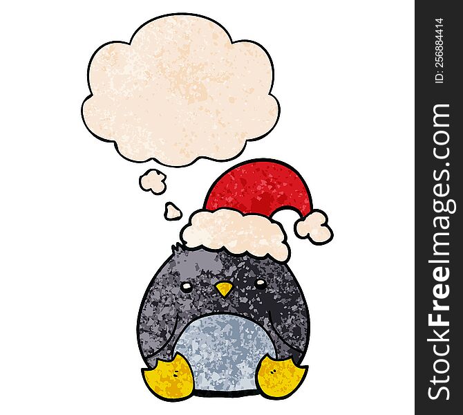 cute cartoon penguin wearing christmas hat and thought bubble in grunge texture pattern style