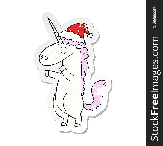 Distressed Sticker Cartoon Of A Unicorn Wearing Santa Hat