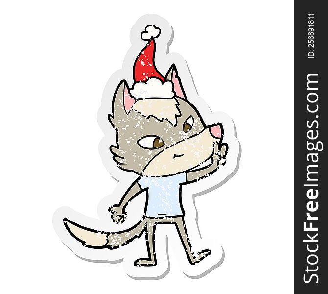 Friendly Distressed Sticker Cartoon Of A Wolf Giving Peace Sign Wearing Santa Hat