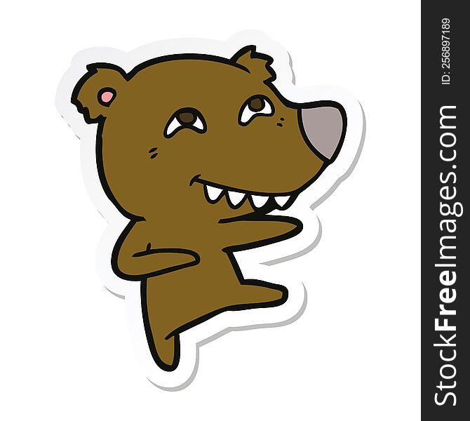sticker of a cartoon bear showing teeth while dancing