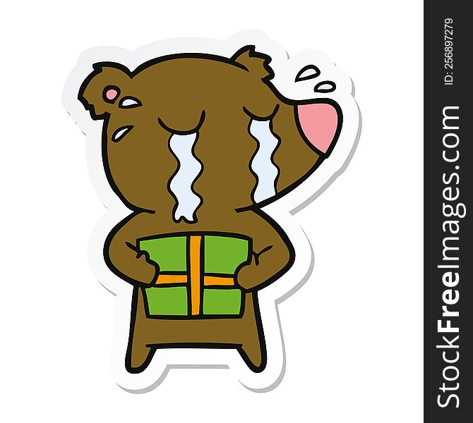 Sticker Of A Cartoon Crying Bear With Present