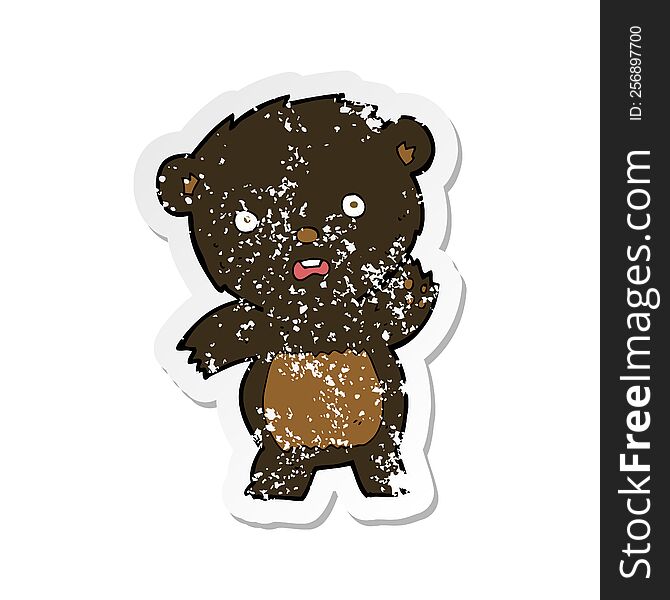 Retro Distressed Sticker Of A Cartoon Waving Black Bear Cub