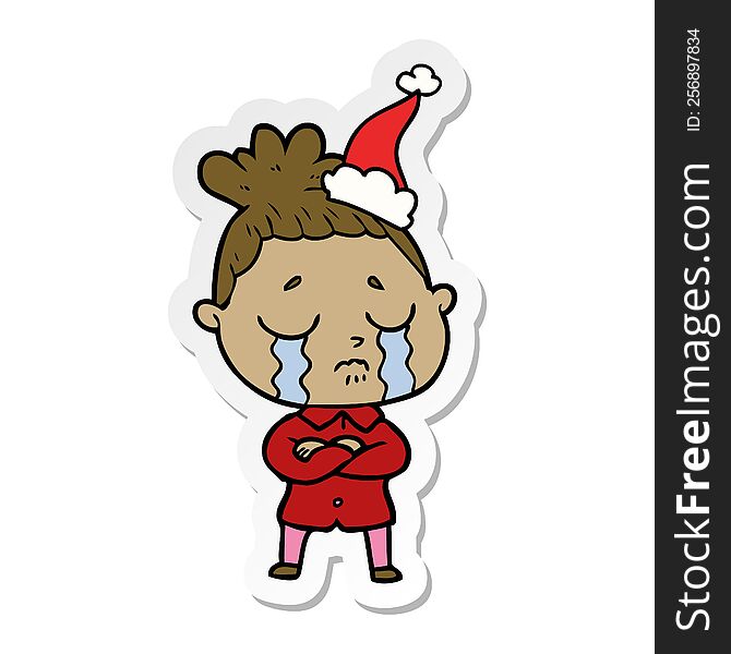 hand drawn sticker cartoon of a crying woman wearing santa hat