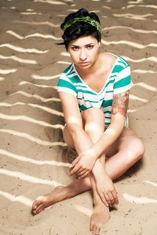 Adorable Girl With Tattoo On The Beach Stock Photo