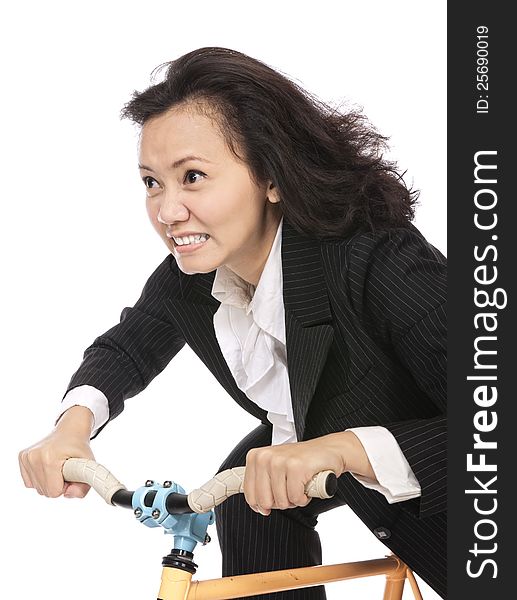 Business woman riding bicycle isolated over white background