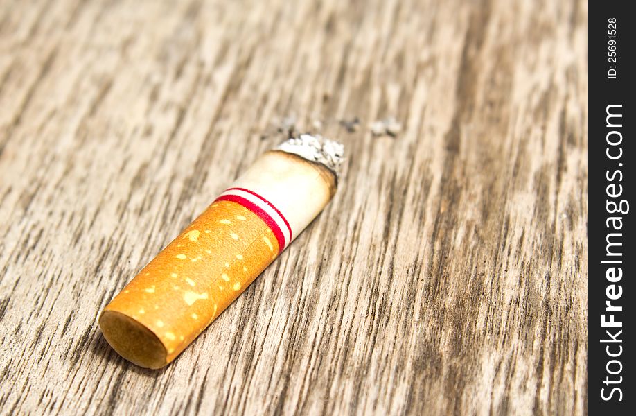 Cigarette On The Wood Floor